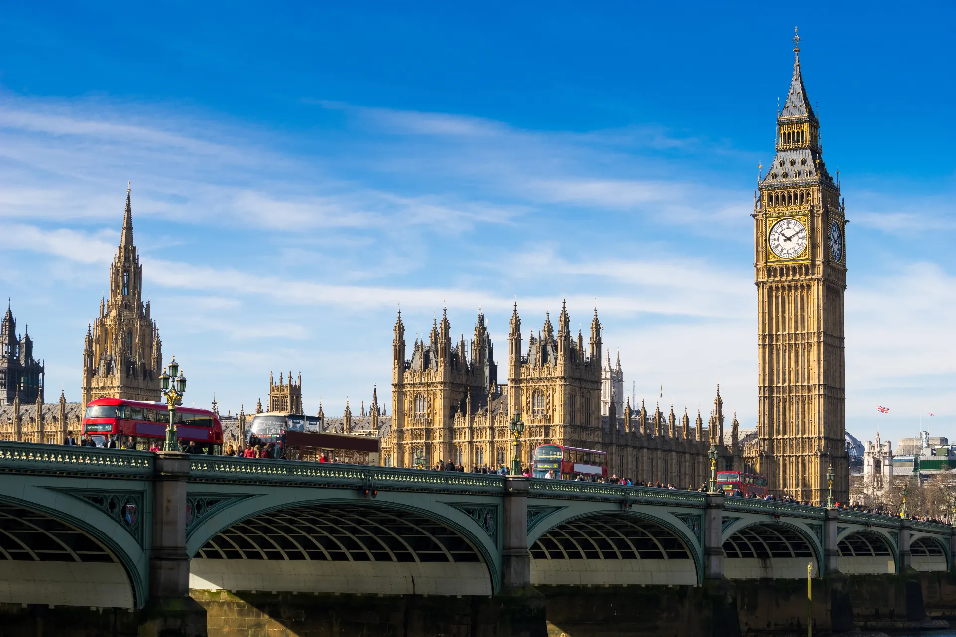 London skyline featuring Big Ben and Westminster Bridge along the Thames, home to VDB Groupe's UK office serving institutional capital partners.