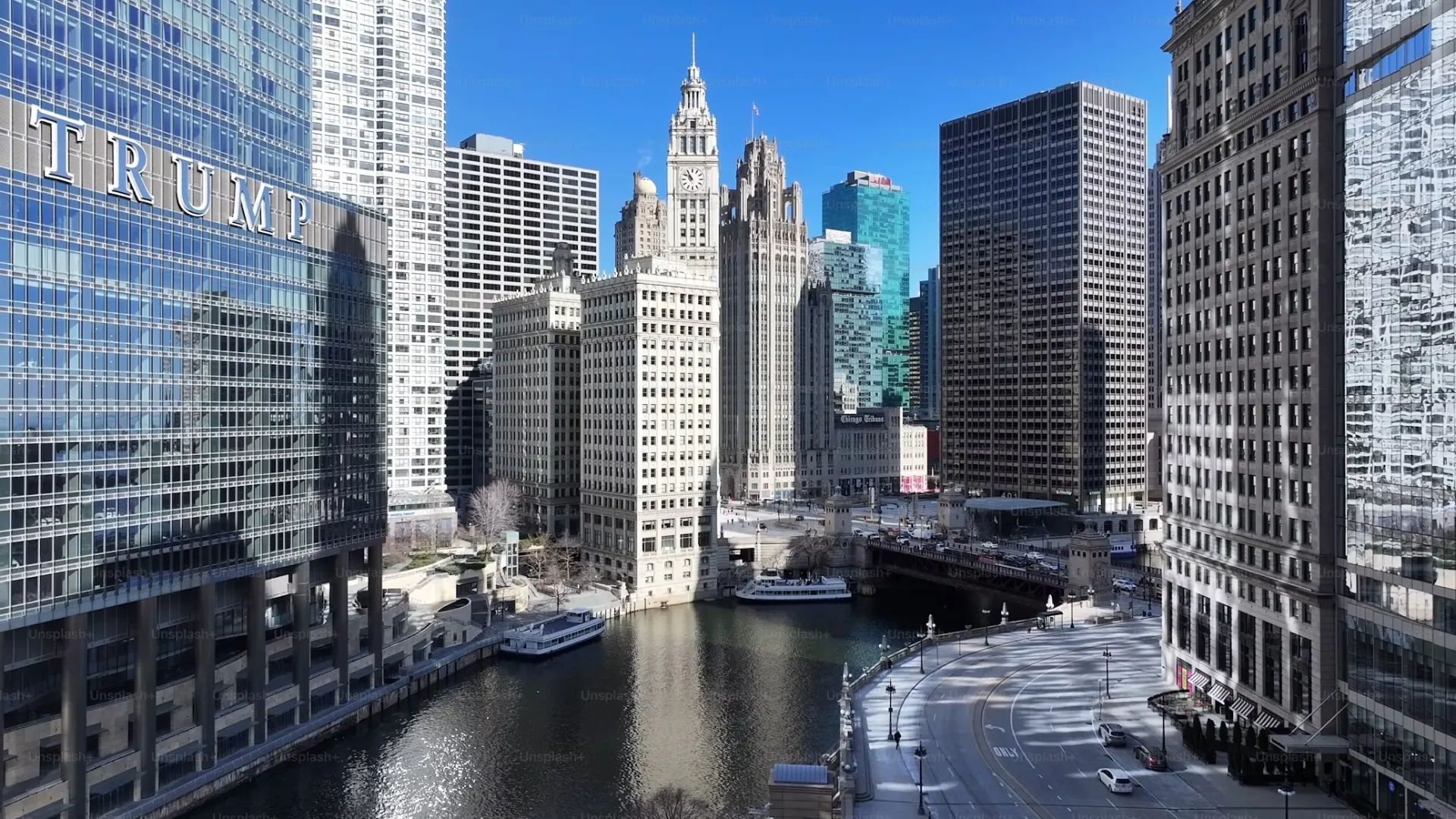 Chicago River winding through downtown high-rises with the Trump International Hotel and Tower sign, representing VDB Asset Management's 5-decade institutional real estate presence in the city.